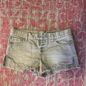 Free People gray distressed jean shorts size 24